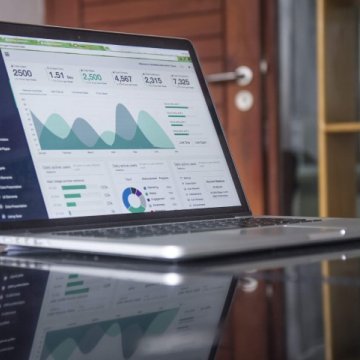 laptop with graphs on them